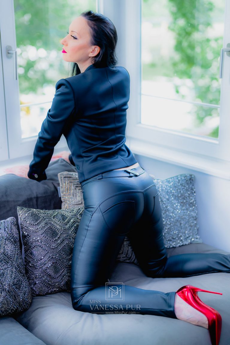 Miss Pur - black leather pants and red high heels - no bra below